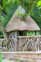 Thatched rustic treehouse 