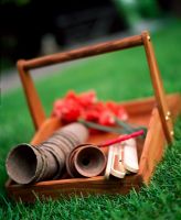 Wooden trug with pots and plant labels