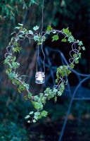 Heart shaped wire decoration with candle