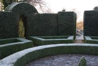 The yew hedges of the Brick Garden contain statues of English monarchs - Kingston Maurward Gardens, Dorchester, Dorset