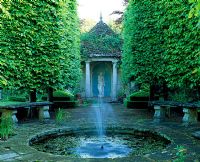 Fountain with view to summerhouse - Watcombe Garden, Somerset