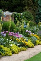 Classical herbaceous border - Waterperry gardens, Oxfordshire, England, UK