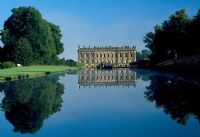 View across the Canal Pond to south facade of house - Chatsworth House, Derbyshire 