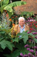 Christopher Lloyd amongst the plants in his exotic garden at Great Dixter