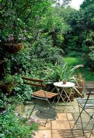 Garden view with patio, table and chairs