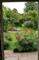 Marijke's Garden. View through the kitchen window in late summer