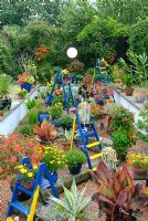 The Summer dry pot garden influenced by Kandinsky's painting 'Improvisation Gorge' of 1914