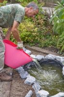 Garden pond project - step by step - adding water 