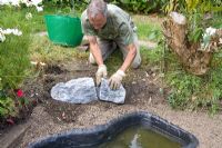 Garden pond project - step by step - adding edging stones 