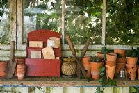 Clay pots and seeds in potting shed