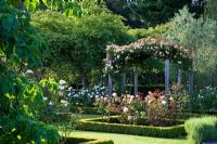 Herbaceous flowerbeds, clipped box hedges and pergola - Breedenbroek, New Zealand