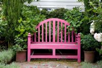 Pink bench on mosaic tiled patio. No. 11, Christchurch, New Zealand