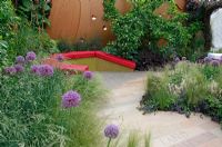 Patio area in The John Joseph Mechi Garden, sponsored by Wilkin and Sons - Bronze medal winner at RHS Chelsea Flower Show 2010