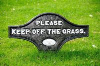 Ornate 'Please Keep off the Grass' sign