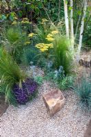 Betula utilis jacquemontii, Thymus 'Redstart', Thymus serphyllum 'Russetings', Helictotrichon sempervirens, Stipa tenuissim, Eryngium bourgatii, Achilea Terracotta, crushed recycled ceramic gravel path with sleepers - 'The Fire Pit Garden' - Silver Medal Winner at the RHS Hampton Court Flower Show 2010 