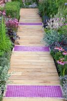 Decked path with pink tiles - 'A Matter of Urgency', Silver Gilt medal winner - RHS Hampton Court Flower Show 2010 
