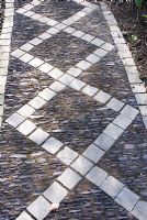 Path made from stone setts and embedded pebbles at Summerdale House, Cumbria NGS