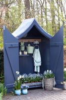 Painted wooden storage shed