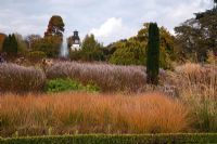 Overlooking the Italian Garden with grasses and seedheads of perennials, designed by Tom Stuart-Smith at Trentham Gardens, Staffordshire, October
