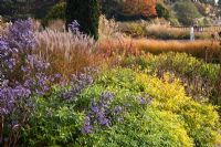 The Italian Garden with grasses and seedheads of perennials, designed by Tom Stuart-Smith - Trentham Gardens, Staffordshire, October