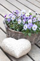 Pansies in basket and heart ornament 