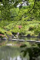 Eastern garden with millstone stepping stones - Isuien Gardens, Nara, Japan