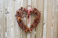 Autumn rustic decoration with red and orange berries
