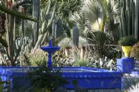 Blue fountain in Jardin Majorelle in Marrakech, Morocco