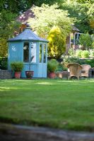 Painted summerhouse on lawn - Ham Cottage, Sussex