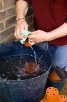 Washing and disinfecting plastic pots