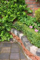 Path and walls made of reclaimed paviours, red tiles, cobbles and red bricks with Buxus - Box hedge - Brocklebank Road, Southport, Lancashire NGS 
