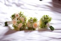 Wedding bouquet bride and bridesmaids with Roses, Ornithogalum and Lilies