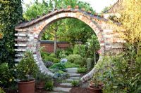 Circular entrance into Asian styled garden