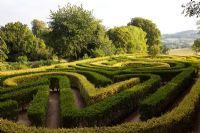 250th anniversary Maze created in 1999 of Ligustrum ovalifolium and Ligustrum ovalifolium 'Aurem' - Privet and Golden Privet. Painswick Rococo Garden, Gloucesetershire, UK, August