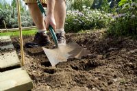 step by step, making a raised bed - digging trench