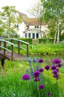 Monet style bridge with meadow and house - Wickets, NGS Essex