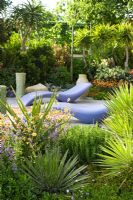 Mediterranean style garden with Aloe, rosemary and citrus tree - 'A Monaco garden', RHS Chelsea Flower Show 2011