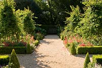 The Rose Garden below the castle, uses penstemons and roses in the box edged beds with roses trained around obelisks in their centres.