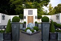 Topiary in zinc planters - 'A Place in the Garden'