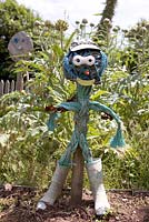 Scarecrow made from recycled coastal objects - Coastal allotment, Mousehole, Cornwall