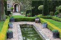 The formal pond edged with box hedging at The Dower House