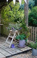 Decking with containers in summer