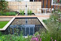 Elke Borkowski The Brewin Dolphin Garden - contemporary garden with water feature, sculpture, table and chairs