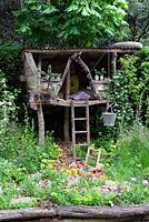 Garden of magical childhood, showing tree house