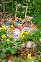 Play area with toys in The NSPCC Garden of Magical Childhood