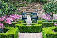 Knot garden with sundial, box edged beds planted with Nerine Bowdenii 