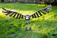 'Eagle on a boder fork' by Darren Greenlow - Wyndcliffe Court Sculpture Garden, St Arvans, Monmouthshire, UK. May. The garden was designed by H. Avray Tipping 
