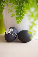 Blown eggs painted black, decorated with paper cut out. Maidenhair Fern - Adiantum