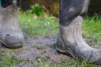 Damage caused by walking through a sodden lawn