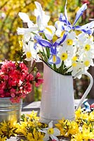Floral arrangements includes Narcissus, Forsythia and Chaenomeles japonica.